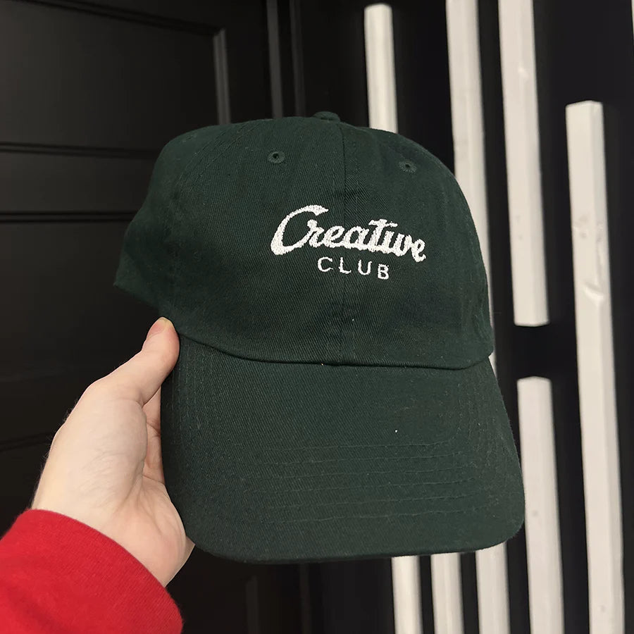 Casquette verte foncée creative club brodée en blanc