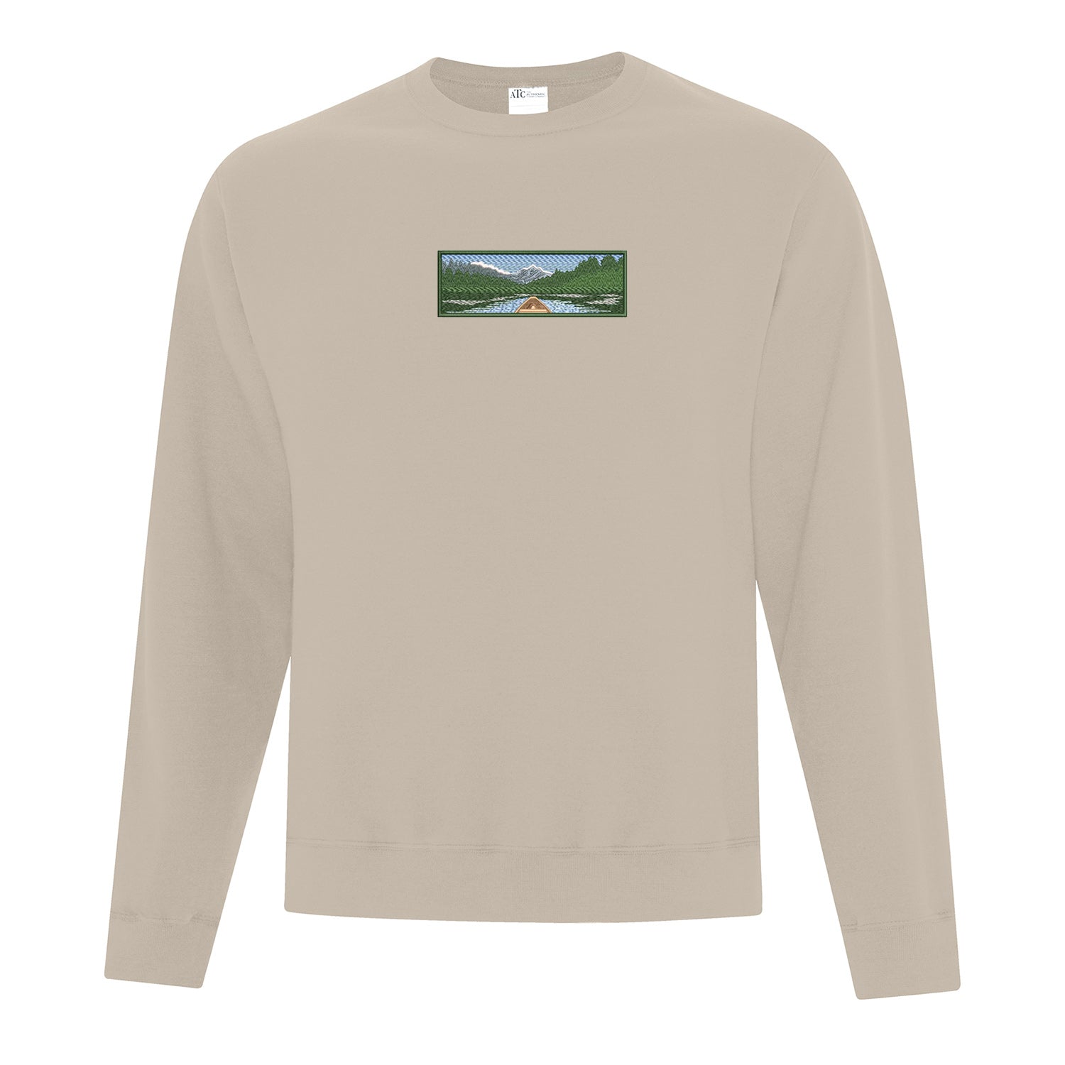 coton ouaté à col rond beige avec une broderie d'un canot sur le bord d'un lac avec une forêt.