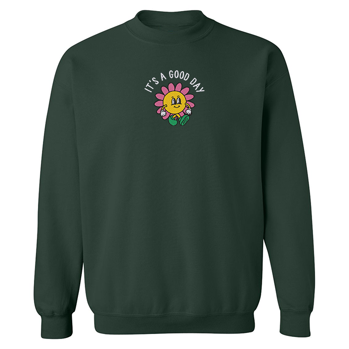 crewneck vert forêt it's a good day brodé avec une personnage animé de fleur illustré par créations oska