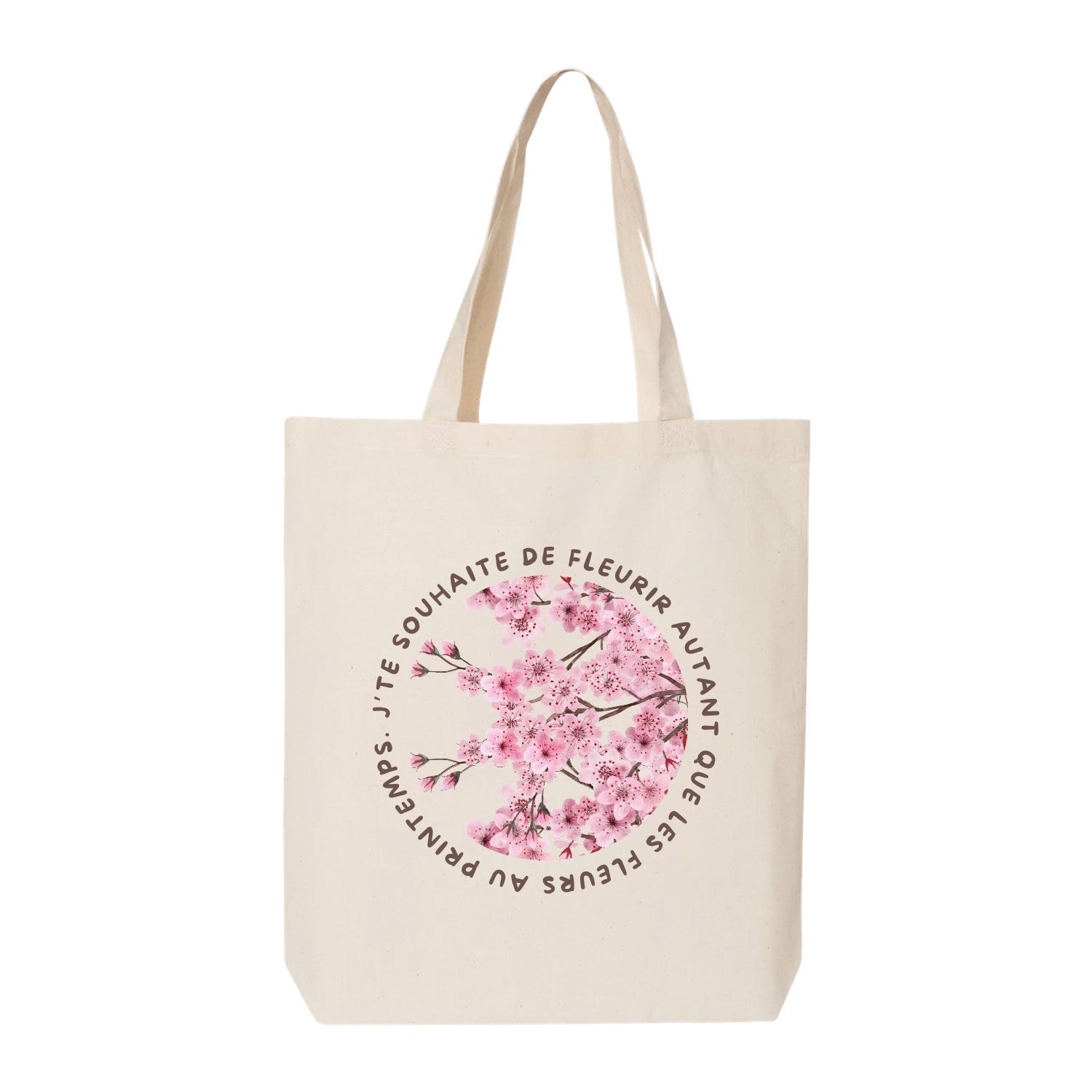 sac fourre-tout beige avec une impression en transfert DTF de fleurs cherry blossoms et une phrase inspirante en français