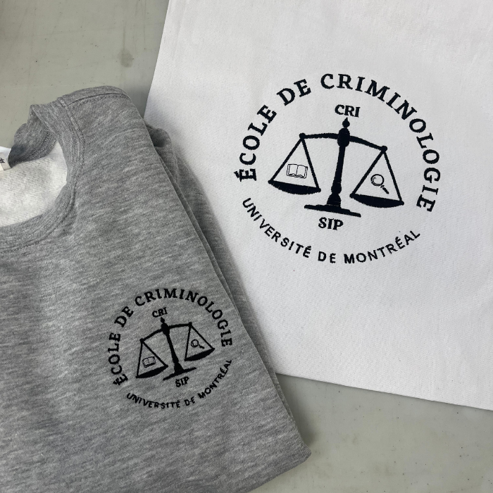 Crewneck et tote bag avec une broderie du logo du programme criminologie de l'université de Montréal faites par Brodame