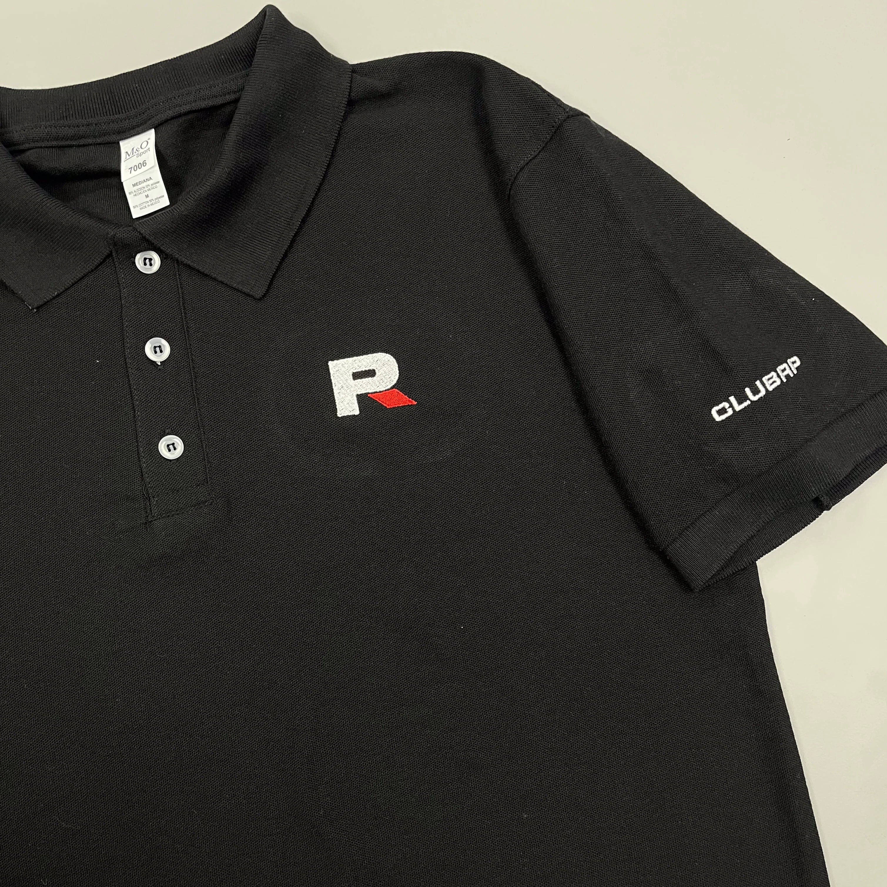 Polo noir Roulez Passion et Club RP avec broderie blanche et rouge faites par Brodame