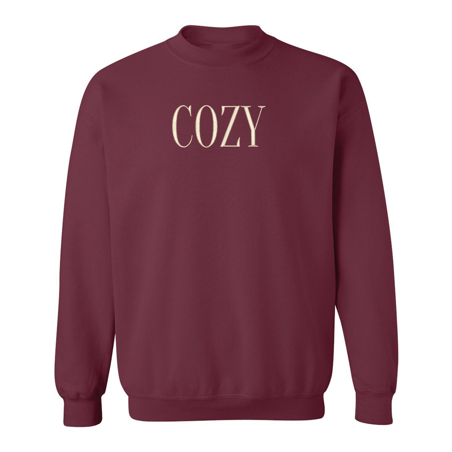 crewneck bourgogne avec une broderie écrit COZY en blanc crème au centre